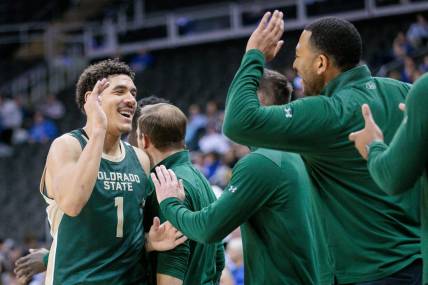 Nov 23, 2023; Kansas City, Missouri, USA; Colorado State Rams forward Joel Scott (1) celebrates with the bench during the game against the Creighton Bluejays at T-Mobile Center. Mandatory Credit: William Purnell-USA TODAY Sports
