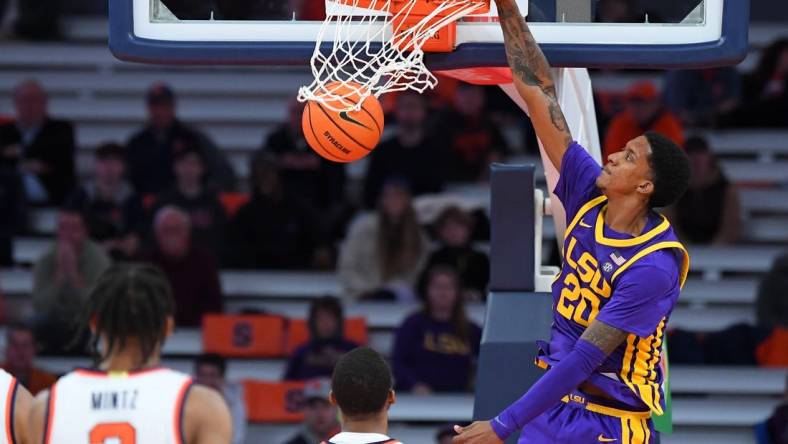 Nov 28, 2023; Syracuse, New York, USA; LSU Tigers forward Derek Fountain (20) dunks the ball against the Syracuse Orange during the second half at the JMA Wireless Dome. Mandatory Credit: Rich Barnes-USA TODAY Sports