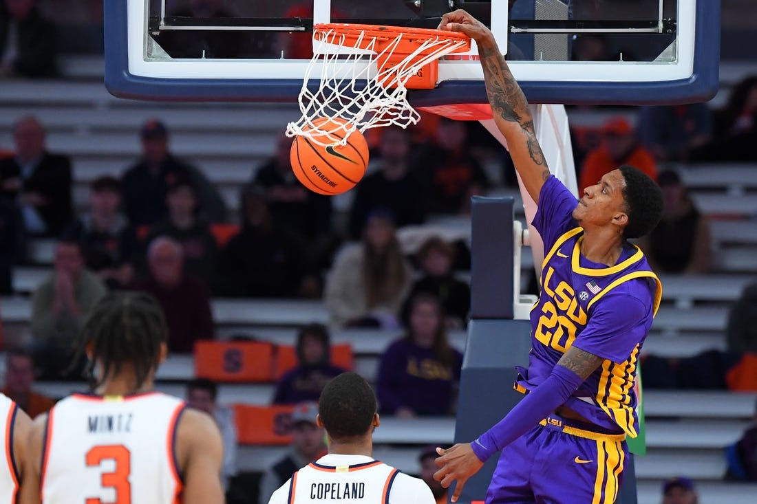 Nov 28, 2023; Syracuse, New York, USA; LSU Tigers forward Derek Fountain (20) dunks the ball against the Syracuse Orange during the second half at the JMA Wireless Dome. Mandatory Credit: Rich Barnes-USA TODAY Sports