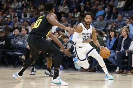 Nov 29, 2023; Memphis, Tennessee, USA; Memphis Grizzlies guard Derrick Rose (23) drives to the basket during the first half against the Utah Jazz at FedExForum. Mandatory Credit: Petre Thomas-USA TODAY Sports