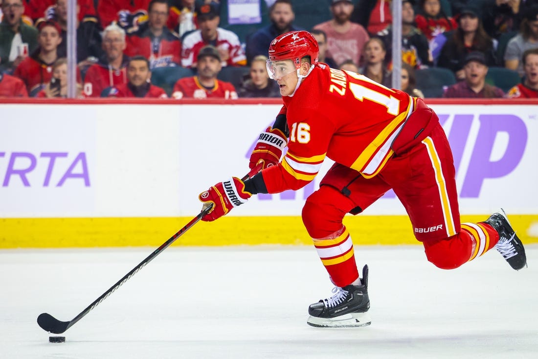 Nov 27, 2023; Calgary, Alberta, CAN; Calgary Flames defenseman Nikita Zadorov (16) skates with the puck against the Vegas Golden Knights during the second period at Scotiabank Saddledome. Mandatory Credit: Sergei Belski-USA TODAY Sports