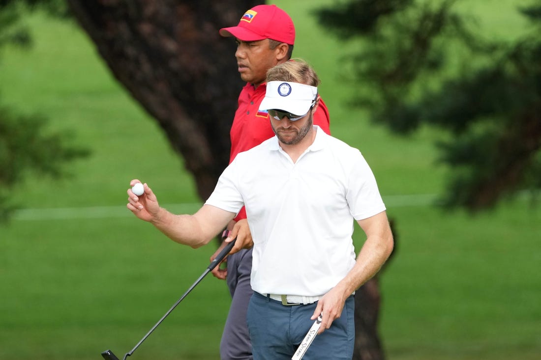 Jul 30, 2021; Tokyo, Japan; Kalle Samooja (FIN) reacts after putting on the second green during round two of the men's individual stroke play of the Tokyo 2020 Olympic Summer Games at Kasumigaseki Country Club. Mandatory Credit: Kyle Terada-USA TODAY Sports