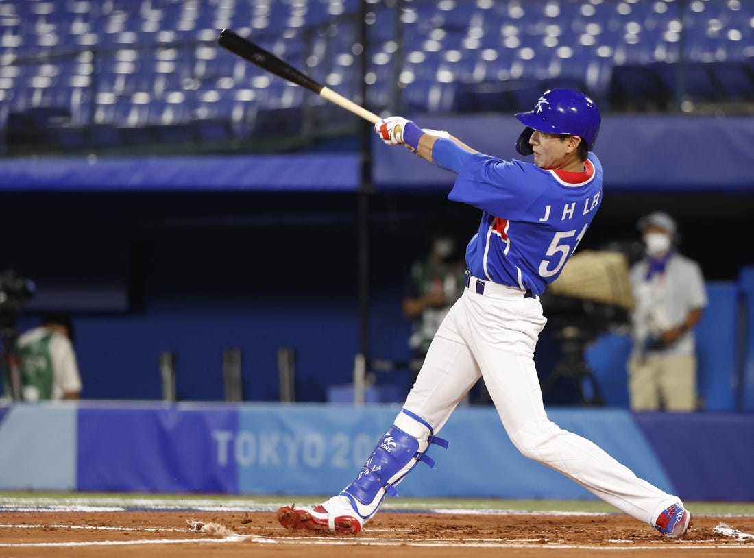 Jul 31, 2021; Yokohama, Japan; Team South Korea outfielder Jung Hoo Lee (51) hits a single against USA during the Tokyo 2020 Olympic Summer Games at Yokohama Baseball Stadium. Mandatory Credit: Yukihito Taguchi-USA TODAY Sports