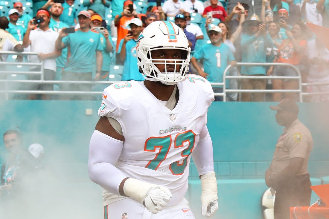 Oct 24, 2021; Miami Gardens, Florida, USA; Miami Dolphins offensive tackle Austin Jackson (73) takes on the field prior the game against the Atlanta Falcons at Hard Rock Stadium. Mandatory Credit: Sam Navarro-USA TODAY Sports