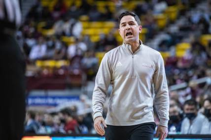 Seattle head coach Chris Victor talks to his players as the New Mexico State Aggies face off against the Seattle Red Hawks at the Pan American Center in Las Cruces on Saturday, Feb. 5, 2022.

Nmsu Su 23