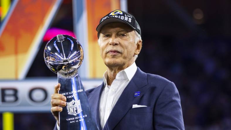 Feb 13, 2022; Inglewood, CA, USA; Los Angeles Rams owner Stan Kroenke celebrates with the Lombardi Trophy after defeating the Cincinnati Bengals during Super Bowl LVI at SoFi Stadium. Mandatory Credit: Mark J. Rebilas-USA TODAY Sports