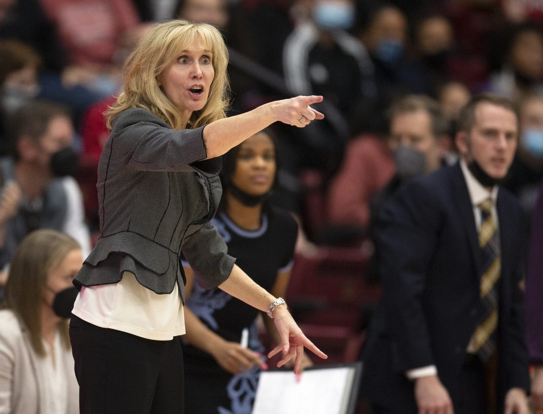 Feb 26, 2022; Stanford, California, USA; Washington Huskies head coach Tina Langley calls in a play to her team during the fourth quarter against the Stanford Cardinal at Maples Pavilion. Mandatory Credit: D. Ross Cameron-USA TODAY Sports