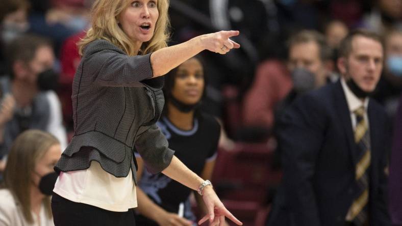 Feb 26, 2022; Stanford, California, USA; Washington Huskies head coach Tina Langley calls in a play to her team during the fourth quarter against the Stanford Cardinal at Maples Pavilion. Mandatory Credit: D. Ross Cameron-USA TODAY Sports