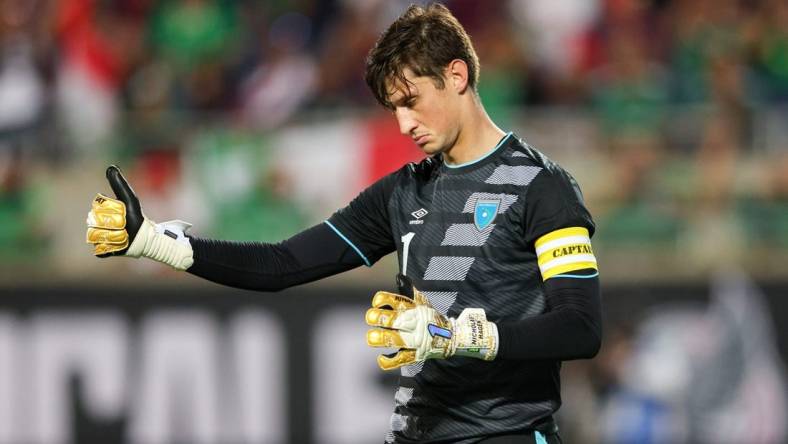 Apr 27, 2022; Orlando, FL, USA; Guatemala goalkeeper Nicholas Hagen (1) reacts after a missed free kick attempt during a match against Mexico at Camping World Stadium. Mandatory Credit: Nathan Ray Seebeck-USA TODAY Sports