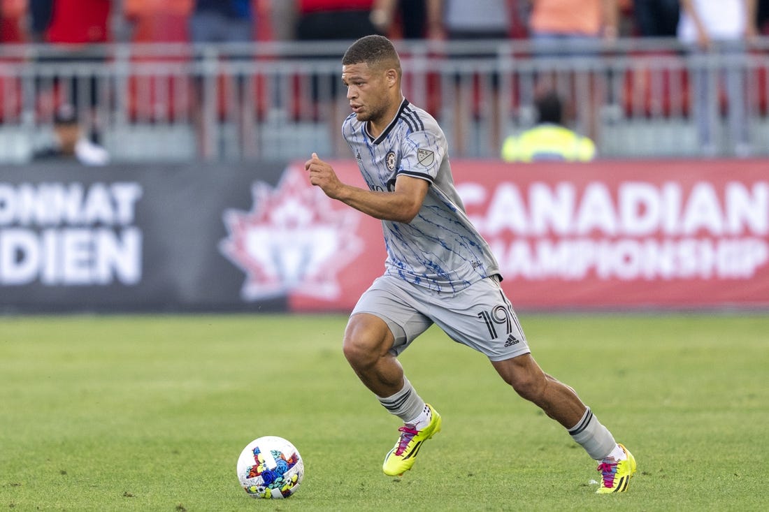 Jun 22, 2022; Toronto, Ontario, USA; CF Montreal defender Zorhan Bassong (19) moves the ball against Toronto FC at BMO Field Mandatory Credit: Kevin Sousa-USA TODAY Sports