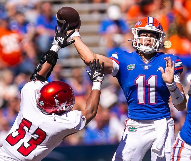 Eastern Washington Eagles linebacker Elijah Rodriguez (52) gets a hand on Florida Gators quarterback Jalen Kitna (11) in the second half at Steve Spurrier Field at Ben Hill Griffin Stadium in Gainesville, FL on Sunday, October 2, 2022. [Doug Engle/Gainesville Sun]

Ncaa Football Florida Gators Vs Eastern Washington Eagles