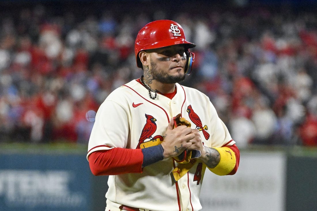 Oct 8, 2022; St. Louis, Missouri, USA; St. Louis Cardinals catcher Yadier Molina (4) walks off the field after hitting a single for his final postseason at bat in the ninth inning against the Philadelphia Phillies during game two of the Wild Card series for the 2022 MLB Playoffs at Busch Stadium. Mandatory Credit: Jeff Curry-USA TODAY Sports