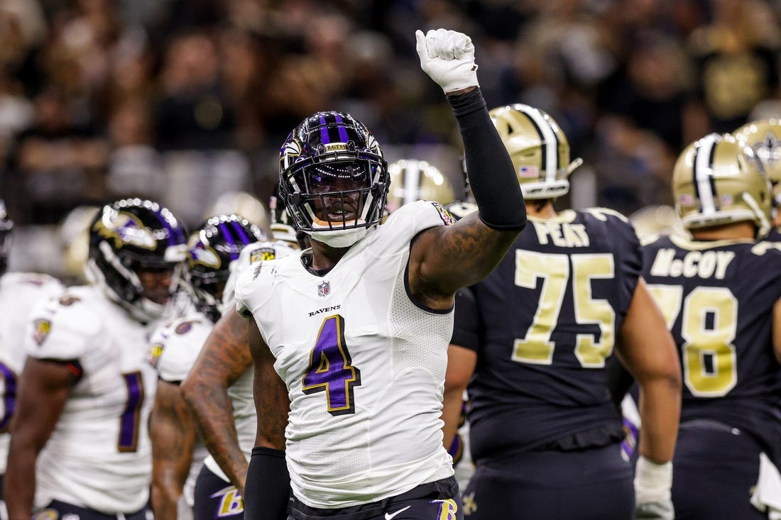 Nov 7, 2022; New Orleans, Louisiana, USA;  Baltimore Ravens linebacker Jason Pierre-Paul (4) signals a 4th down stop against the New Orleans Saints during the first half at Caesars Superdome. Mandatory Credit: Stephen Lew-USA TODAY Sports