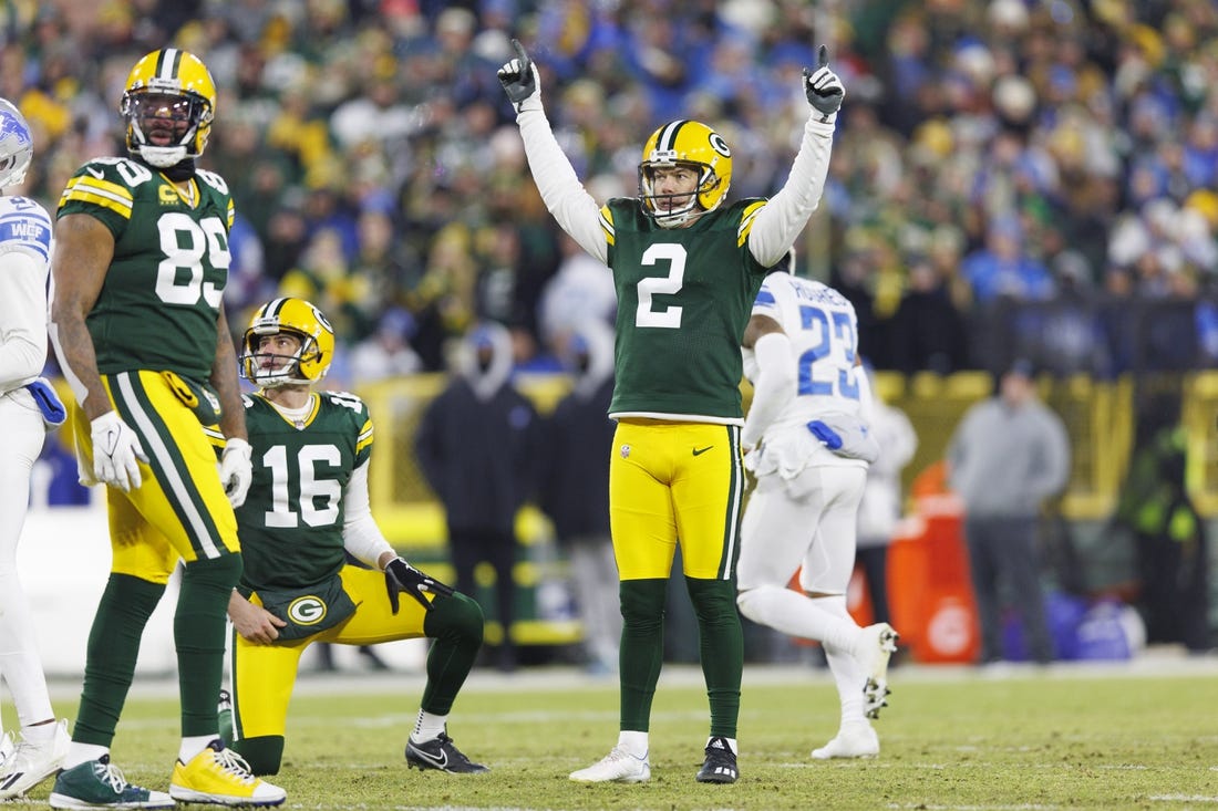 Jan 8, 2023; Green Bay, Wisconsin, USA;  Green Bay Packers kicker Mason Crosby (2) celebrates after making a a field goal during the second quarter against the Detroit Lions at Lambeau Field. Mandatory Credit: Jeff Hanisch-USA TODAY Sports