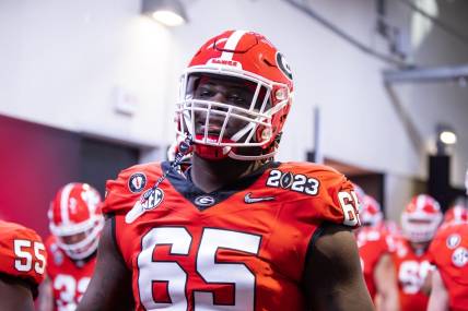 Jan 9, 2023; Inglewood, CA, USA; Georgia Bulldogs offensive lineman Amarius Mims (65) against the TCU Horned Frogs during the CFP national championship game at SoFi Stadium. Mandatory Credit: Mark J. Rebilas-USA TODAY Sports