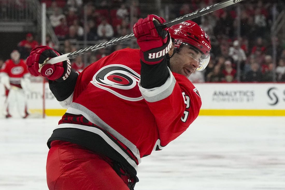 Jan 19, 2023; Raleigh, North Carolina, USA; Carolina Hurricanes left wing Max Pacioretty (67) takes a shot against the Minnesota Wild in the third period at PNC Arena. Mandatory Credit: James Guillory-USA TODAY Sports