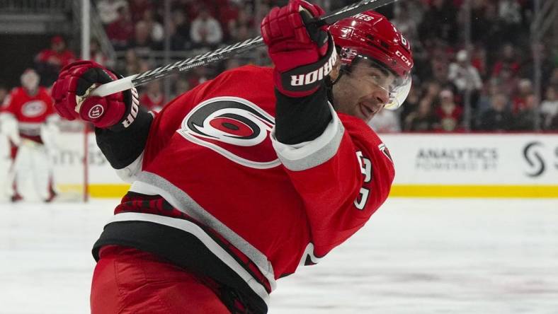 Jan 19, 2023; Raleigh, North Carolina, USA; Carolina Hurricanes left wing Max Pacioretty (67) takes a shot against the Minnesota Wild in the third period at PNC Arena. Mandatory Credit: James Guillory-USA TODAY Sports