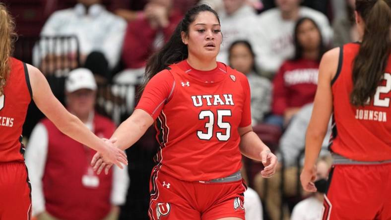 (File photo) Utah Utes forward Alissa Pili (35) is congratulated by guard Gianna Kneepkens (left) and forward Jenna Johnson (right) during the third quarter against the Stanford Cardinal at Maples Pavilion. Mandatory Credit: Darren Yamashita-USA TODAY Sports