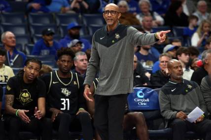 Feb 16, 2023; Memphis, Tennessee, USA; UCF Knights head coach Johnny Dawkins reacts during the first half against the Memphis Tigers at FedExForum. Mandatory Credit: Petre Thomas-USA TODAY Sports