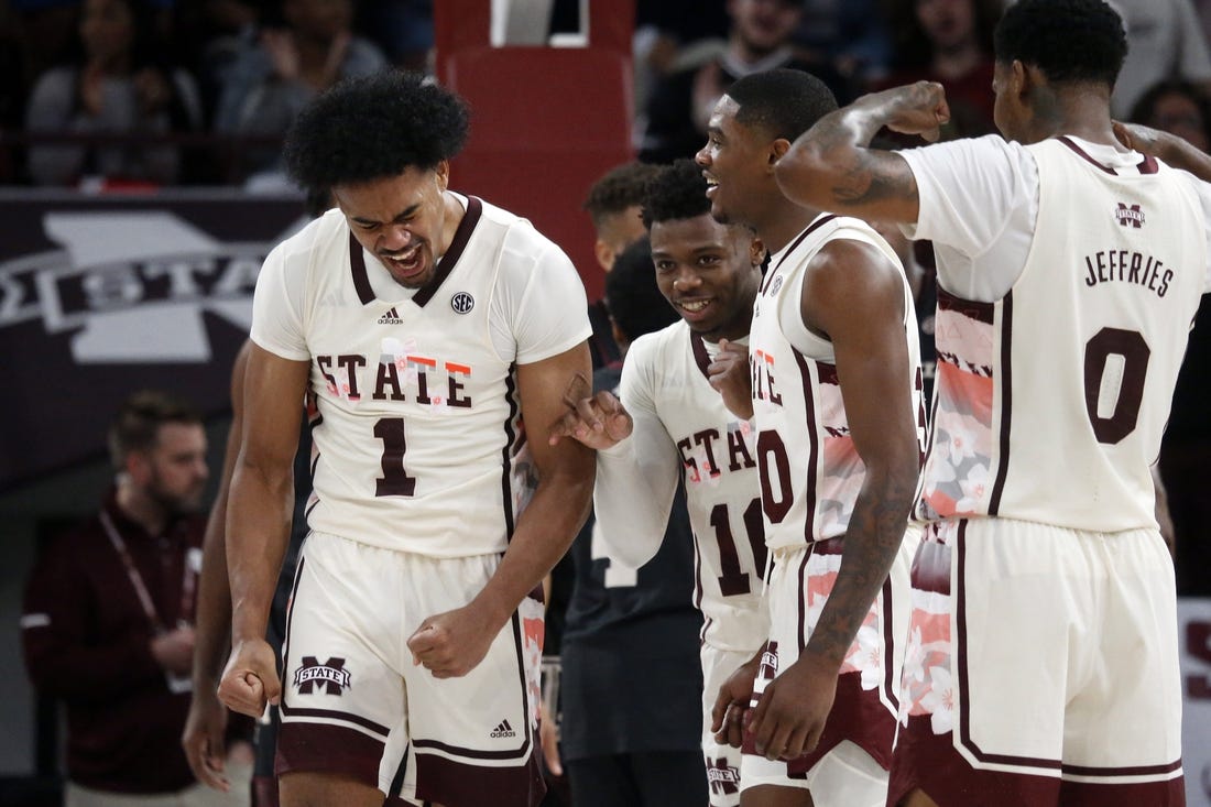 Feb 25, 2023; Starkville, Mississippi, USA; Mississippi State Bulldogs forward Tolu Smith (1) reacts with teammates after a basket during the second half against the Texas A&M Aggies at Humphrey Coliseum. Mandatory Credit: Petre Thomas-USA TODAY Sports