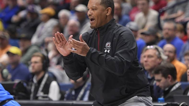 Mar 8, 2023; Nashville, TN, USA;  South Carolina Gamecocks Lamont Paris cheers his team on against the Mississippi Rebels during the first half at Bridgestone Arena. Mandatory Credit: Steve Roberts-USA TODAY Sports