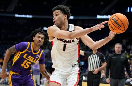 Georgia guard Jabri Abdur-Rahim (1) passes the ball past LSU forward Tyrell Ward (15) during the second half of a first round SEC Men   s Basketball Tournament game at Bridgestone Arena Wednesday, March 8, 2023, in Nashville, Tenn.

Sec Basketball Lsu Vs Georgia