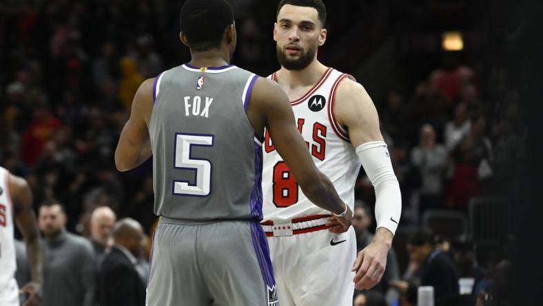 Mar 15, 2023; Chicago, Illinois, USA; Sacramento Kings guard De'Aaron Fox (5) and Chicago Bulls guard Zach LaVine (8) talk after the game at the United Center. Mandatory Credit: Matt Marton-USA TODAY Sports