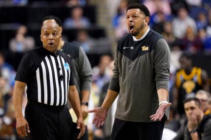 Pittsburgh Panthers head coach Jeff Capel III argues with an official in the second half of a second-round college basketball game between the Pittsburgh Panthers and the Xavier Musketeers in the NCAA Tournament, Sunday, March 19, 2023, at Greensboro Coliseum in Greensboro, N.C. The Xavier Musketeers won, 84.73.

Ncaa Xavier Pitt Basketball March 19 0502