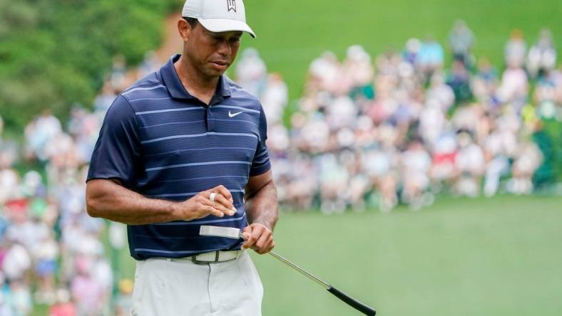 April 7: Tiger Woods reacts to his putt on the sixth green during the second round of the Masters.

Pga Masters Tournament Second Round