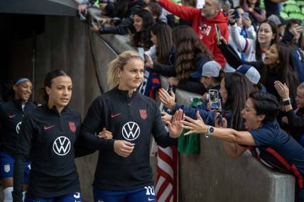 Apr 8, 2023; Austin, Texas, USA; U.S. Women's National Team forward Mallory Swanson (9) and midfielder Linsey Horan (10) enter the field in a match against the Republic of Ireland Women's National Team at Q2 Stadium. Mandatory Credit: Dustin Safranek-USA TODAY Sports