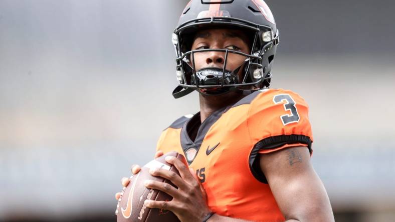 Oregon State quarterback Aidan Chiles (3) warms up before the spring showcase at Reser Stadium, Saturday, April 22, 2023, in Corvallis, Ore.

Oregon State Spring Game224