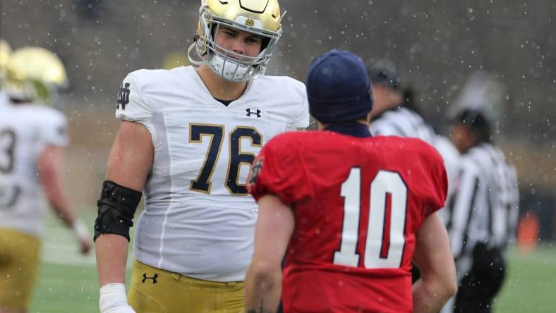 Notre Dame All-American left tackle Joe Alt, like Fighting Irish quarterback Sam Hartman (10), decided to skip the Sun Bowl to begin preparation for the 2024 NFL Draft.