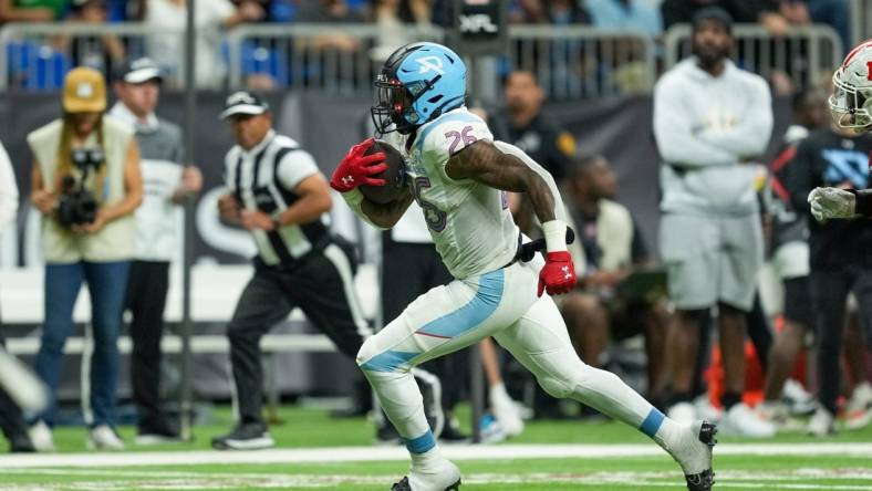 May 13, 2023; San Antonio, TX, USA;  Arlington Renegades running back Leddie Brown (26) runs for a score in the second half against the DC Defenders at the Alamodome. Mandatory Credit: Daniel Dunn-USA TODAY Sports