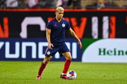 May 20, 2023; Chicago, Illinois, USA;  Chicago Fire FC defender Miguel Navarro (6) controls the ball against the Atlanta United FC at Soldier Field. Mandatory Credit: Jamie Sabau-USA TODAY Sports