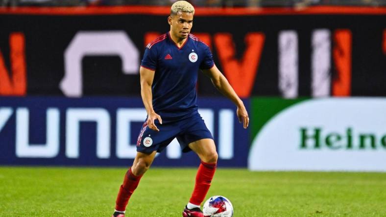 May 20, 2023; Chicago, Illinois, USA;  Chicago Fire FC defender Miguel Navarro (6) controls the ball against the Atlanta United FC at Soldier Field. Mandatory Credit: Jamie Sabau-USA TODAY Sports