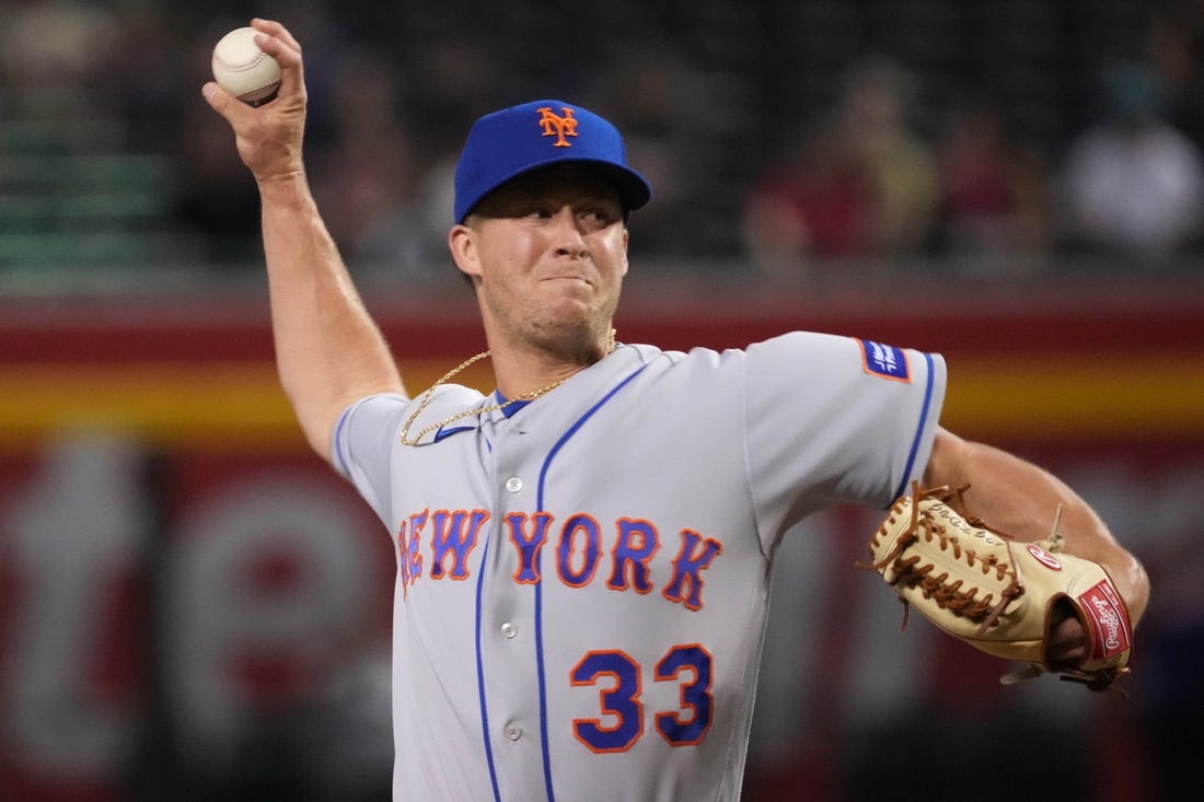 Jul 6, 2023; Phoenix, Arizona, USA; New York Mets relief pitcher Trevor Gott (33) pitches against the Arizona Diamondbacks during the ninth inning at Chase Field. Mandatory Credit: Joe Camporeale-USA TODAY Sports