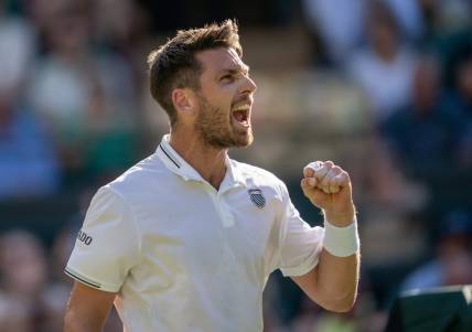 Jul 7, 2023; London, United Kingdom; Cameron Norrie (GBR) reacts to a point during his match against Christopher Eubanks (USA) on day five of Wimbledon at the All England Lawn Tennis and Croquet Club.  Mandatory Credit: Susan Mullane-USA TODAY Sports
