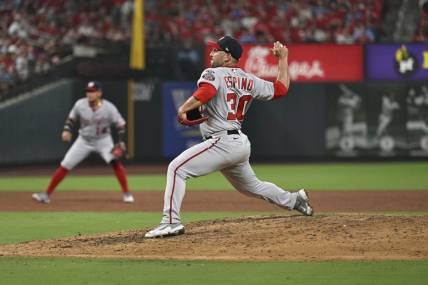 Jul 15, 2023; St. Louis, Missouri, USA; Washington Nationals relief pitcher Paolo Espino (30) throws against the St. Louis Cardinals during the sixth inning in game 2 of a double header at Busch Stadium. Mandatory Credit: Jeff Le-USA TODAY Sports