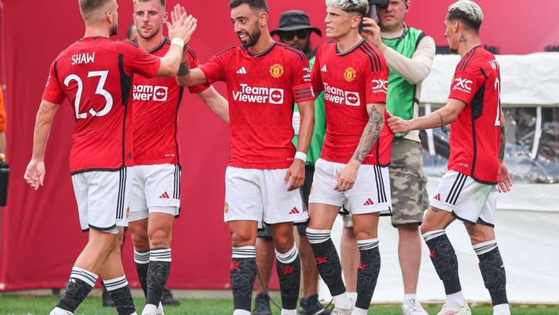 Jul 22, 2023; East Rutherford, New Jersey, USA; Manchester United midfielder Bruno Fernandes (8) celebrates his goal with teammates during the first half against Arsenal at MetLife Stadium. Mandatory Credit: Vincent Carchietta-USA TODAY Sports