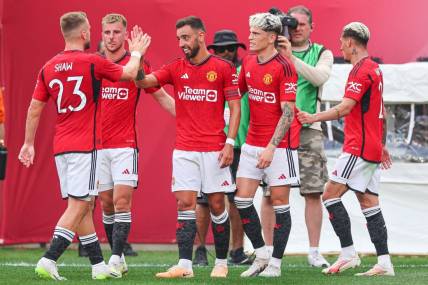 Jul 22, 2023; East Rutherford, New Jersey, USA; Manchester United midfielder Bruno Fernandes (8) celebrates his goal with teammates during the first half against Arsenal at MetLife Stadium. Mandatory Credit: Vincent Carchietta-USA TODAY Sports