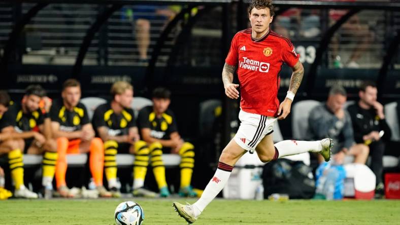 Jul 30, 2023; Las Vegas, Nevada, USA;  Manchester United defender Victor Lindelof (2) moves the ball during the second half against Borussia Dortmund at Allegiant Stadium. Mandatory Credit: Lucas Peltier-USA TODAY Sports