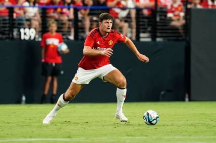 Jul 30, 2023; Las Vegas, Nevada, USA;  Manchester United defender Harry Maguire (5) moves the ball during the first half against Borussia Dortmund at Allegiant Stadium. Mandatory Credit: Lucas Peltier-USA TODAY Sports