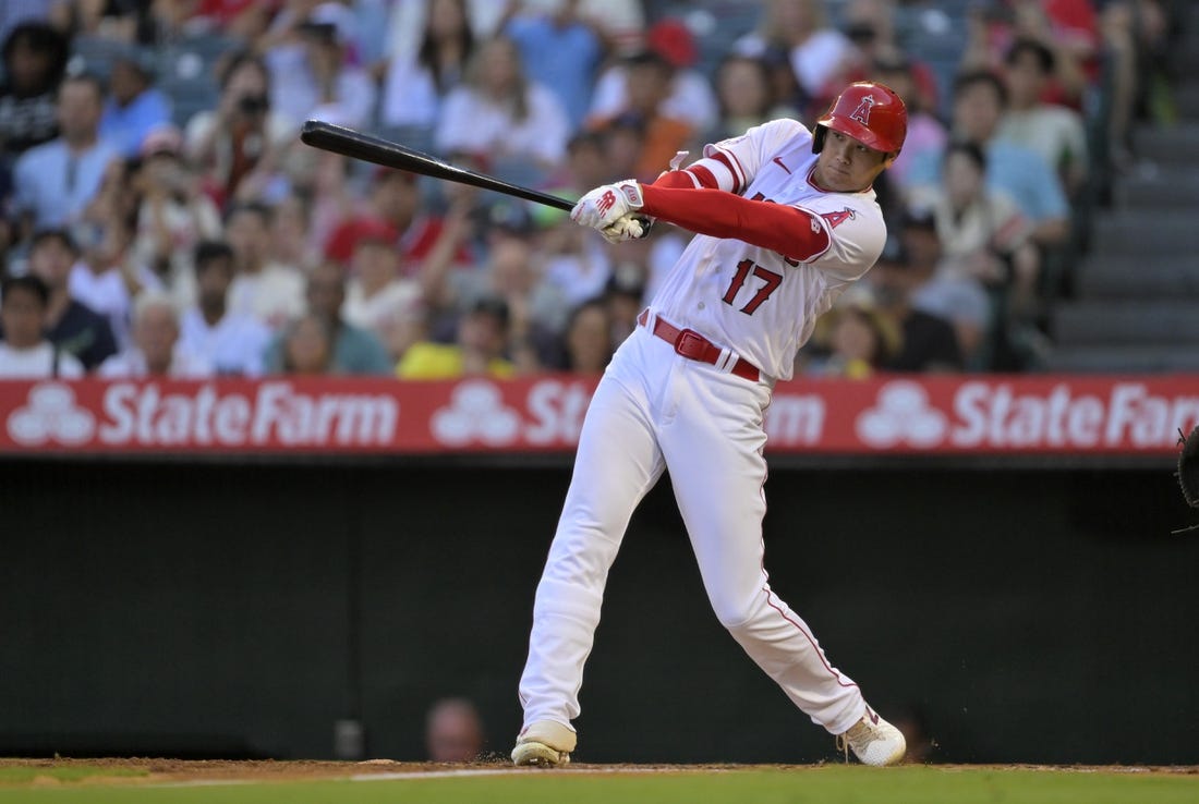 Aug 5, 2023; Anaheim, California, USA; Los Angeles Angels designated hitter Shohei Ohtani (17) lines out to right field in the fourth inning against the Seattle Mariners at Angel Stadium. Mandatory Credit: Jayne Kamin-Oncea-USA TODAY Sports