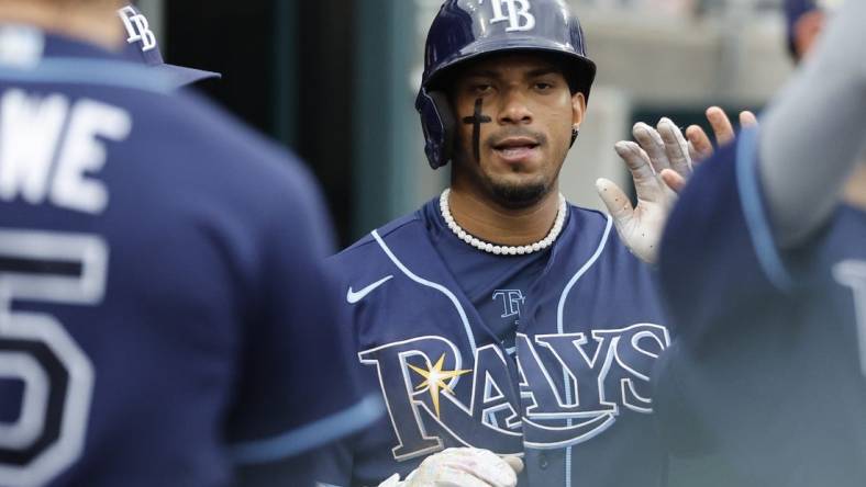 Aug 6, 2023; Detroit, Michigan, USA; Tampa Bay Rays shortstop Wander Franco (5) receives congratulations from teammates after scoring in the sixth inning against the Detroit Tigers at Comerica Park. Mandatory Credit: Rick Osentoski-USA TODAY Sports