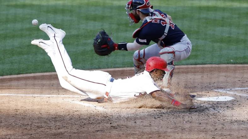 Aug 17, 2023; Washington, District of Columbia, USA; Washington Nationals second baseman Jeter Downs (3) scores a run ahead of a tag by Boston Red Sox catcher Connor Wong (12) on a two run double by Nationals designated hitter Joey Meneses (not pictured) during the fifth inning at Nationals Park. Mandatory Credit: Geoff Burke-USA TODAY Sports