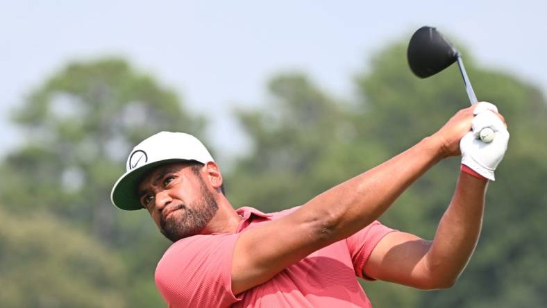 Aug 24, 2023; Atlanta, Georgia, USA; Tony Finau tees off on the 16th hole during the first round of the TOUR Championship golf tournament at East Lake Golf Club. Mandatory Credit: Adam Hagy-USA TODAY Sports