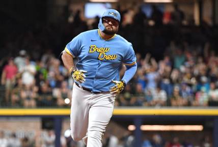 Aug 25, 2023; Milwaukee, Wisconsin, USA; Milwaukee Brewers first baseman Rowdy Tellez (11) rounds the bases after hitting a home run agains the San Diego Padres in the third inning at American Family Field. Mandatory Credit: Michael McLoone-USA TODAY Sports