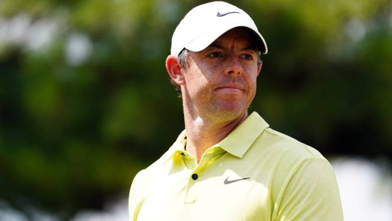 Aug 26, 2023; Atlanta, Georgia, USA; Rory McIlroy reacts to his putt on the third green during the third round of the TOUR Championship golf tournament at East Lake Golf Club. Mandatory Credit: John David Mercer-USA TODAY Sports