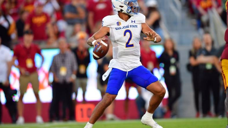 Aug 26, 2023; Los Angeles, California, USA; San Jose State Spartans quarterback Chevan Cordeiro (2) drops back to pass against the Southern California Trojans during the first half at Los Angeles Memorial Coliseum. Mandatory Credit: Gary A. Vasquez-USA TODAY Sports