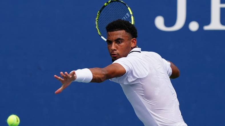 Aug 29, 2023; Flushing, NY, USA;  Arthur Fils of France hits a shot against Tallon Griekspoor of Netherlands on day two of the 2023 U.S. Open tennis tournament at the USTA Billie Jean King National Tennis Center. Mandatory Credit: Jerry Lai-USA TODAY Sports